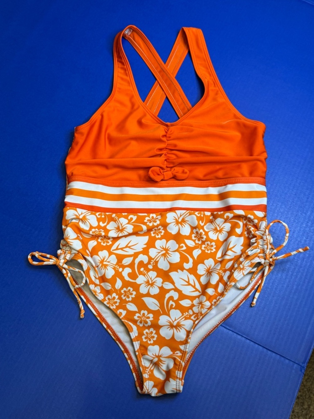 Girls Orange Floral One-Piece Swimsuit with Crisscross Straps